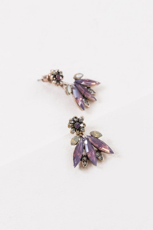 A pair of Halcyon Ear Jacket Earrings against a white background.