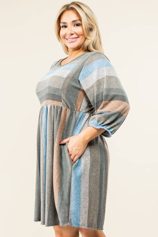 A person stands smiling, dressed in a Mix Stripe Balloon Sleeve Midi Dress that features multi-colored horizontal stripes in shades of blue, brown, and gray. The midi dress, crafted from polyester, includes three-quarter sleeves and handy pockets.