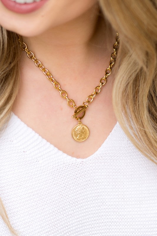 A close-up of a woman wearing a Coin Accent Chain Necklace.
