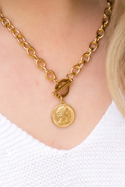 A close-up of a woman wearing a Coin Accent Chain Necklace.