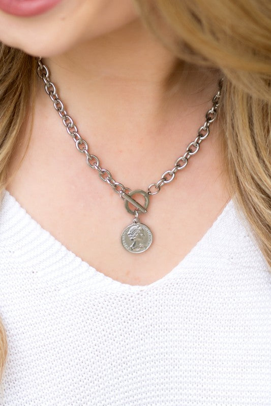 A close-up of a woman wearing a Coin Accent Chain Necklace.