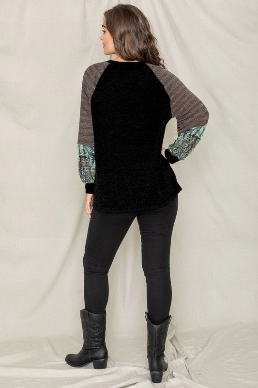 Person wearing the Terry Stripe Bishop Sleeve Tunic, standing against a neutral background.