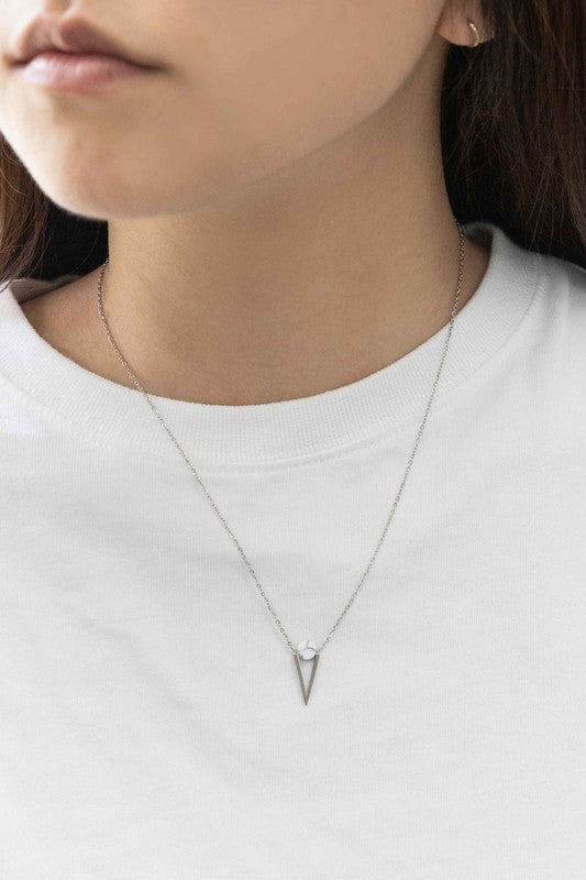 The Tensly Point Stone Necklace Silver collection features three charm necklaces with silver chains, each showcasing a triangular pendant enhanced by a circular accent in black, turquoise, and white. Displayed on a light background, these stainless steel pieces elegantly emphasize the allure of natural stones.