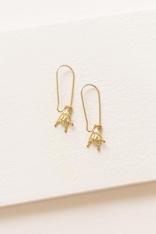 The Rock On Hook Earrings feature an elegant design and are made from 14k gold-plated stainless steel, combining both style and durability.