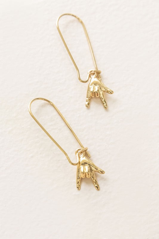 The Rock On Hook Earrings feature an elegant design and are made from 14k gold-plated stainless steel, combining both style and durability.