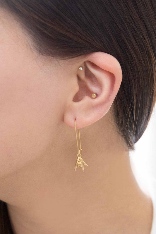 The Rock On Hook Earrings feature an elegant design and are made from 14k gold-plated stainless steel, combining both style and durability.