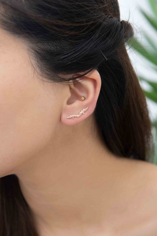 Three pairs of Love Bird Ear Pin Earrings, elegantly designed in gold, rose gold, and silver tones, showcased beautifully on a light background.