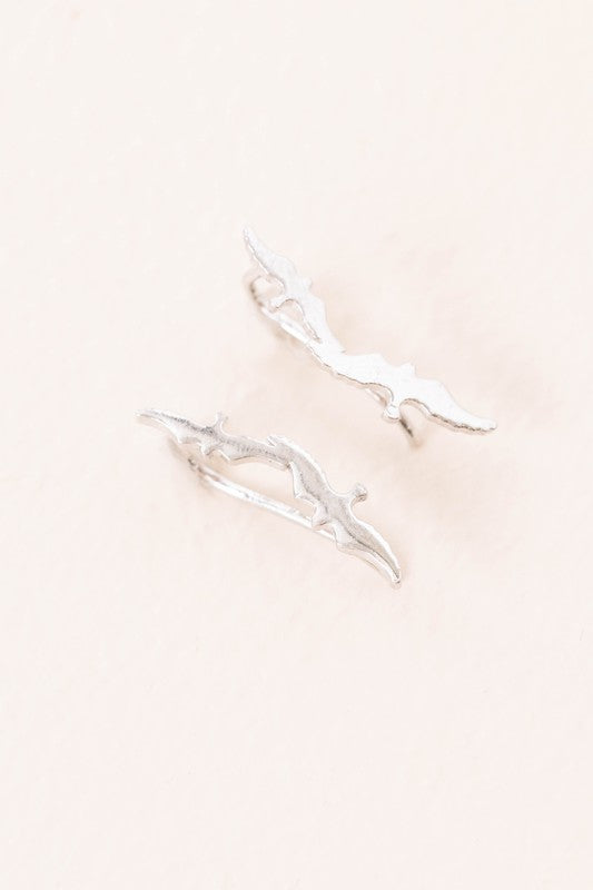 Three pairs of Love Bird Ear Pin Earrings, elegantly designed in gold, rose gold, and silver tones, showcased beautifully on a light background.