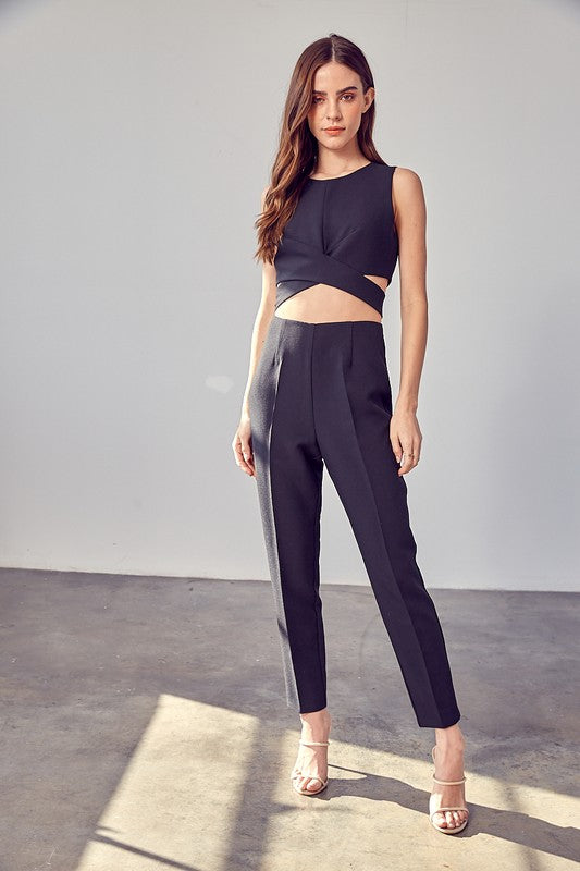 A woman wearing the High Waisted Slim Pants.