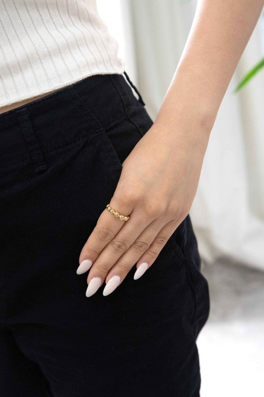 The Bubbly Ring, crafted with 14k gold plating and featuring a beaded design, is showcased against a simple white background.