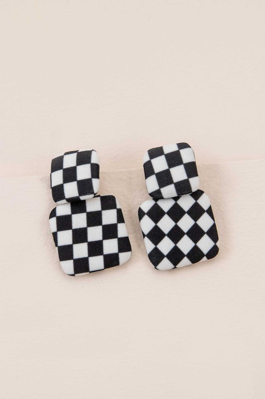 Textile Drop Earrings with a retro design featuring a black and white checkered pattern on a beige background.