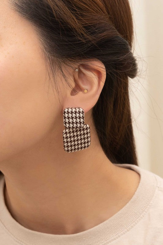 Textile Drop Earrings with a retro design featuring a black and white checkered pattern on a beige background.