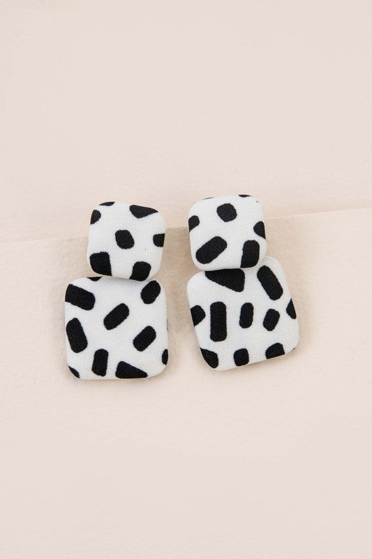 Textile Drop Earrings with a retro design featuring a black and white checkered pattern on a beige background.