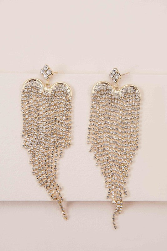 The Heartbreaker Dangle Earrings feature a cascading design embellished with rhinestones, beautifully plated in 10k gold.