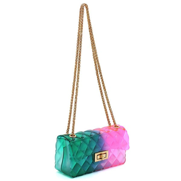 The Quilt Embossed Multi Color Jelly Shoulder Bag features a quilted gradient design transitioning from pink to yellow, adorned with gold-tone hardware that includes a rectangular gold clasp and chain strap.