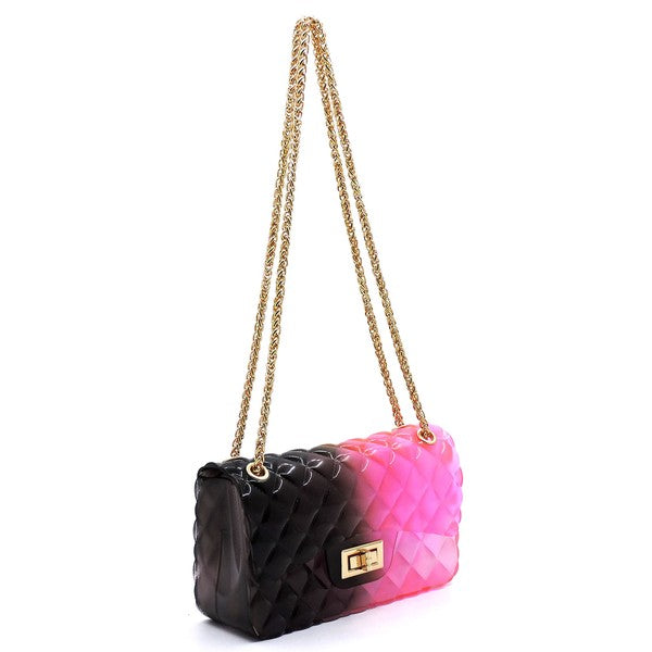 The Quilt Embossed Multi Color Jelly Shoulder Bag features a quilted gradient design transitioning from pink to yellow, adorned with gold-tone hardware that includes a rectangular gold clasp and chain strap.