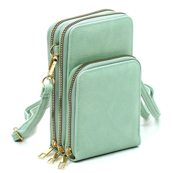 Fashion Crossbody Bag Cell Phone Purse, designed in a sleek mint green color and crafted from vegan leather, features three zippered compartments and a detachable strap, making it a perfect stylish accessory to use as a crossbody bag.