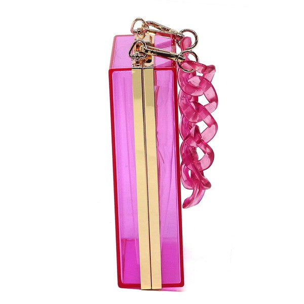 The Acrylic Chain Handle See Thru Crossbody Clutch is a rectangular pink acrylic crossbody clutch that features a sleek gold chain strap and a detachable shoulder chain, highlighted by an elegant pink acrylic chain handle.