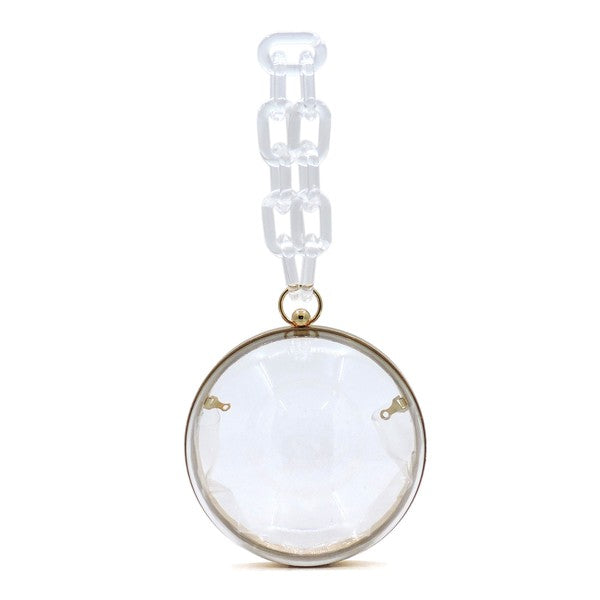 An Acrylic Chain Handle See Thru Ball Crossbody Bag in orange.