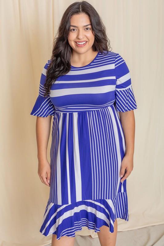 A person wearing a Plus Mix Stripe Ruffle Midi Dress stands against a beige background, smiling.