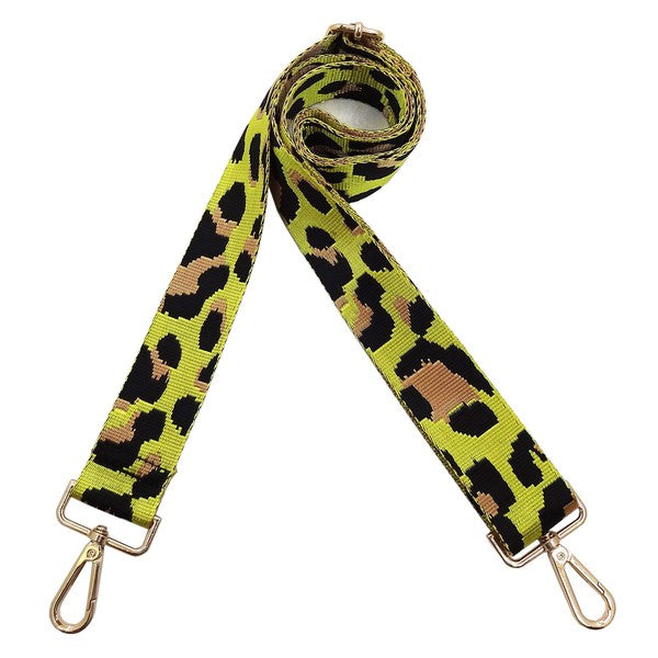 A coiled Fashion Rainbow Print Shoulder Strap that features vibrant colors and adjustable length, complete with gold clips on each end.