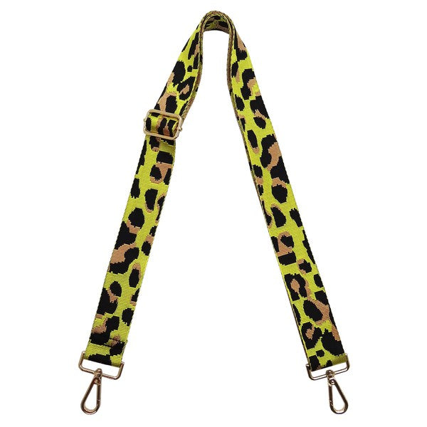 A coiled Fashion Rainbow Print Shoulder Strap that features vibrant colors and adjustable length, complete with gold clips on each end.