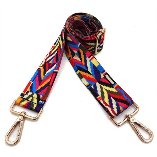 A coiled Fashion Rainbow Print Shoulder Strap that features vibrant colors and adjustable length, complete with gold clips on each end.