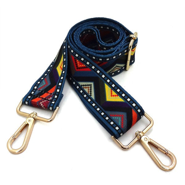 A coiled Fashion Rainbow Print Shoulder Strap that features vibrant colors and adjustable length, complete with gold clips on each end.