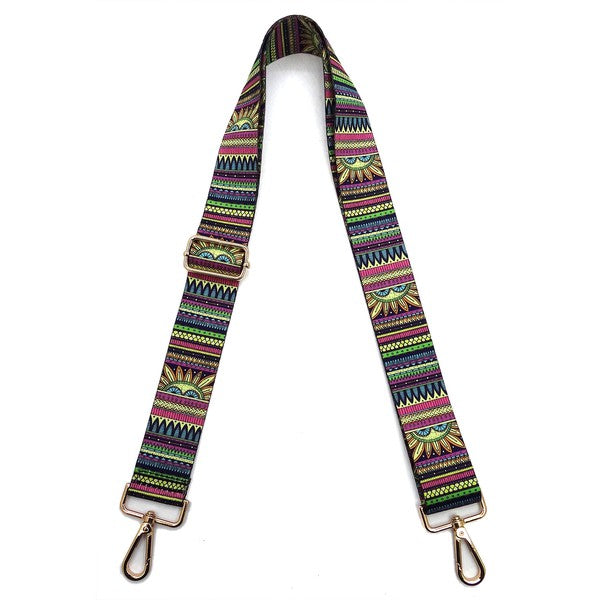 A coiled Fashion Rainbow Print Shoulder Strap that features vibrant colors and adjustable length, complete with gold clips on each end.