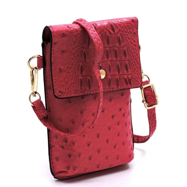 Ostrich Croc Crossbody Cell Phone Case made from red faux vegan leather, featuring a snap button closure, detachable shoulder strap, and gold hardware.