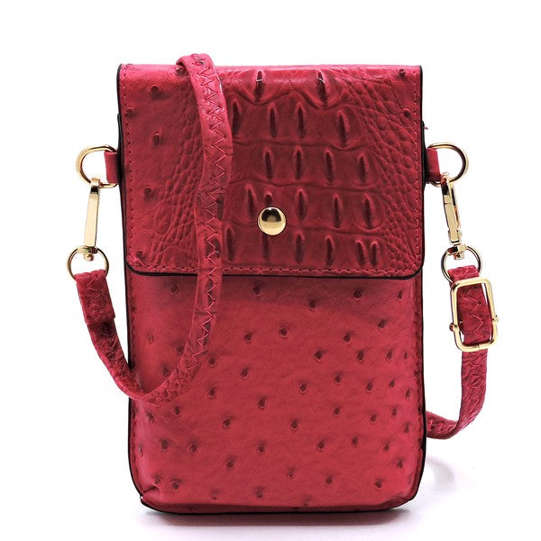 Ostrich Croc Crossbody Cell Phone Case made from red faux vegan leather, featuring a snap button closure, detachable shoulder strap, and gold hardware.