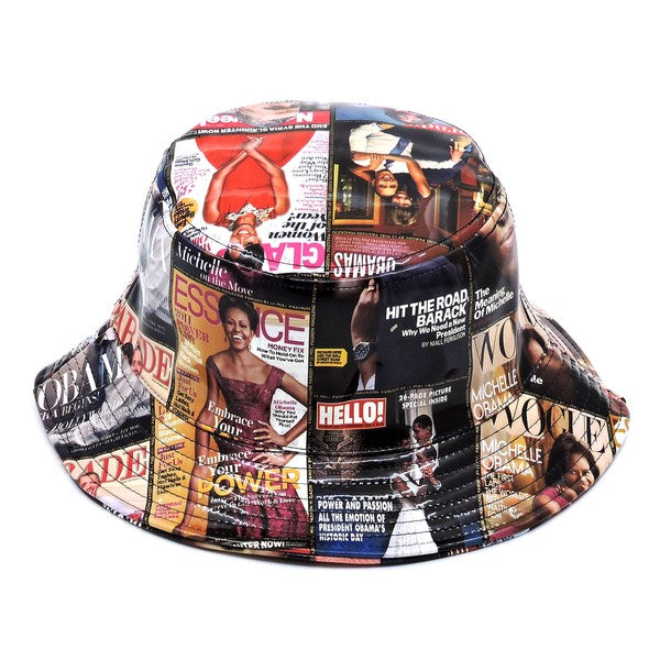 Introducing the Magazine Cover Collage Hat, a chic bucket hat available in one size. It showcases vibrant magazine covers depicting a woman in various poses and outfits, and is adorned with faux vegan leather accents for a perfect fusion of bold style and eco-friendly sophistication.