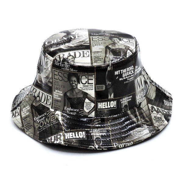 Introducing the Magazine Cover Collage Hat, a chic bucket hat available in one size. It showcases vibrant magazine covers depicting a woman in various poses and outfits, and is adorned with faux vegan leather accents for a perfect fusion of bold style and eco-friendly sophistication.