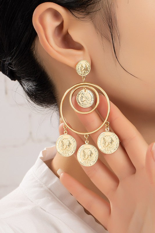 Double hoop drop earrings with three coin dangles each, displayed on a white surface.