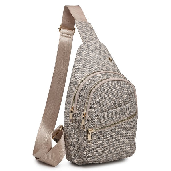 Monogram Sling Backpack in gray and white with a triangle pattern and faux leather accents, featuring a cream strap and multiple zippered compartments.