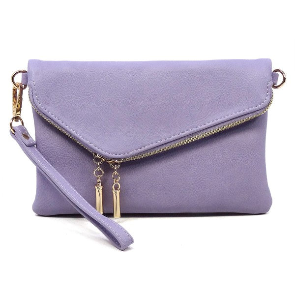 The Fashion Envelope Foldover Clutch showcases an elegant design with its purple faux leather exterior, highlighted by a gold zipper and playful tassels. It comes equipped with a wrist strap and a detachable shoulder strap, offering versatile carrying options.