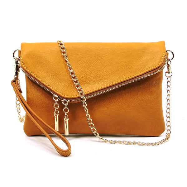 The Fashion Envelope Foldover Clutch showcases an elegant design with its purple faux leather exterior, highlighted by a gold zipper and playful tassels. It comes equipped with a wrist strap and a detachable shoulder strap, offering versatile carrying options.