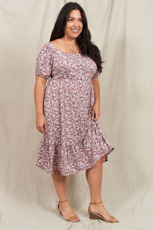 A person wearing the Paisley Floral Square Neck Puff Sleeve Boho Dress stands on a light-colored backdrop.