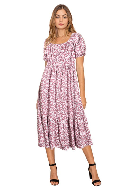 A person wearing the Paisley Floral Square Neck Puff Sleeve Boho Dress stands on a light-colored backdrop.