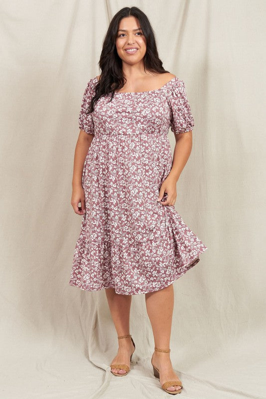 A person wearing the Paisley Floral Square Neck Puff Sleeve Boho Dress stands on a light-colored backdrop.