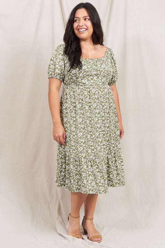 A person wearing the Paisley Floral Square Neck Puff Sleeve Boho Dress stands on a light-colored backdrop.