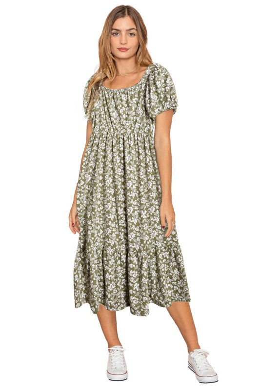 A person wearing the Paisley Floral Square Neck Puff Sleeve Boho Dress stands on a light-colored backdrop.