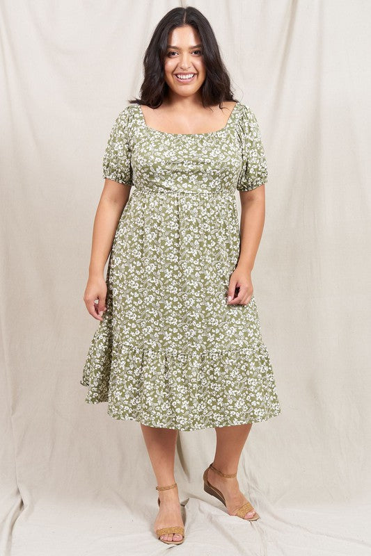 A person wearing the Paisley Floral Square Neck Puff Sleeve Boho Dress stands on a light-colored backdrop.