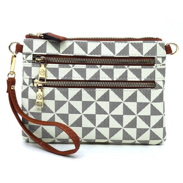 The Monogram Multi Zip Clutch Crossbody Bag Wristlet is a compact clutch with a geometric black and white triangle pattern, featuring a brown vegan leather wrist strap and gold zippers.