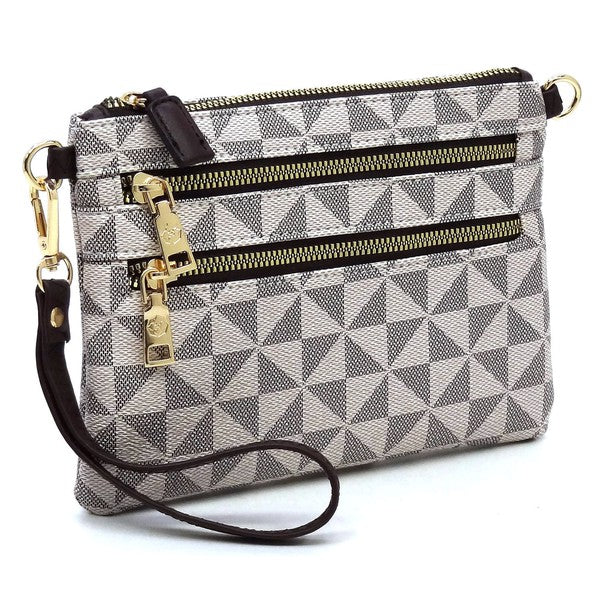 The Monogram Multi Zip Clutch Crossbody Bag Wristlet is a compact clutch with a geometric black and white triangle pattern, featuring a brown vegan leather wrist strap and gold zippers.