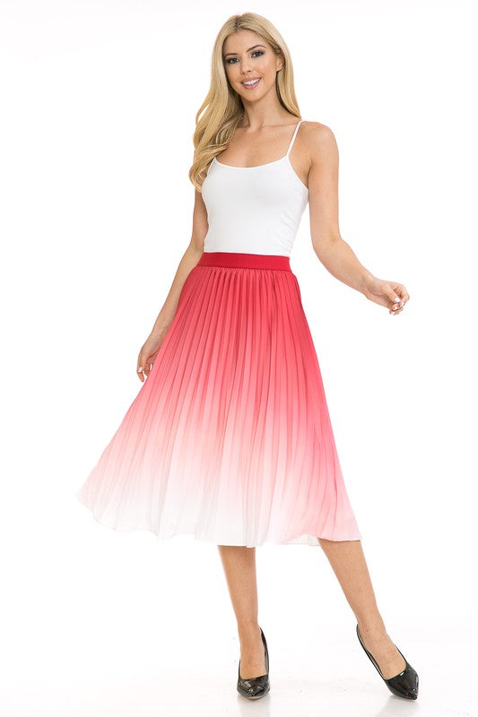 A woman with long blonde hair wears a black sleeveless top paired with the Women's High Waist Pleated A-Line Swing skirt featuring a purple to white gradient pleat and black ballet flats. She poses with one arm slightly bent and the other at her side.