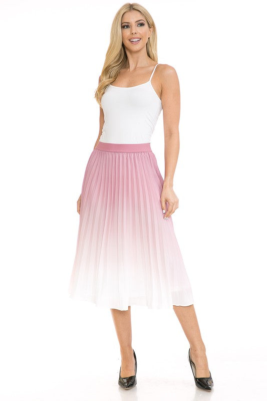 A woman with long blonde hair wears a black sleeveless top paired with the Women's High Waist Pleated A-Line Swing skirt featuring a purple to white gradient pleat and black ballet flats. She poses with one arm slightly bent and the other at her side.