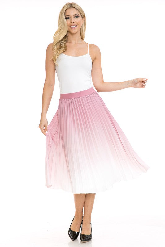 A woman with long blonde hair wears a black sleeveless top paired with the Women's High Waist Pleated A-Line Swing skirt featuring a purple to white gradient pleat and black ballet flats. She poses with one arm slightly bent and the other at her side.