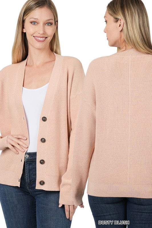 Two views of a woman wearing the Viscose Sweater Cardigan in dusty blush, featuring black button-front closure over a white top and blue jeans. The front view displays her smiling, while the back view highlights the drop shoulder design and cardigan's texture.