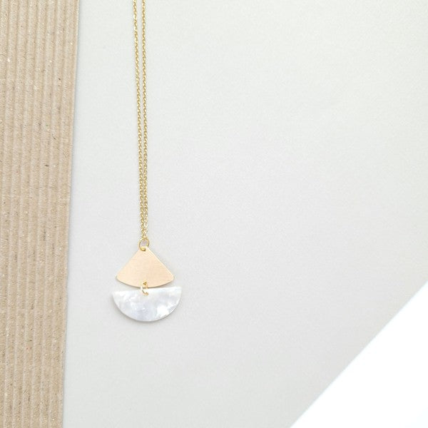 Introducing the Ava Pearl Necklace: an 18K gold-plated chain featuring a pendant with a wooden triangular segment and a white semi-circle segment, displayed on a light background. This tarnish-resistant piece is perfect for adding elegance to any outfit.